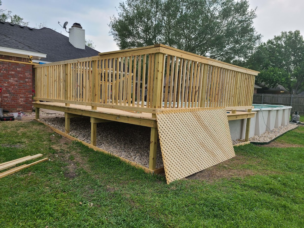 Timber deck build by an above-ground pool